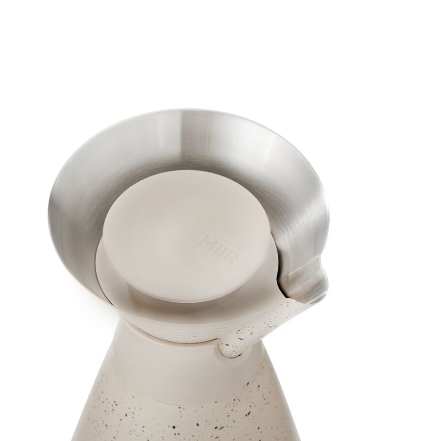 new-standard-carafe-a0 WebPDP-33oz_New_Standard_Carafe_Desert_Tan_Speckle_Studio__CAR1SVOS224_45_Lid_On.jpg