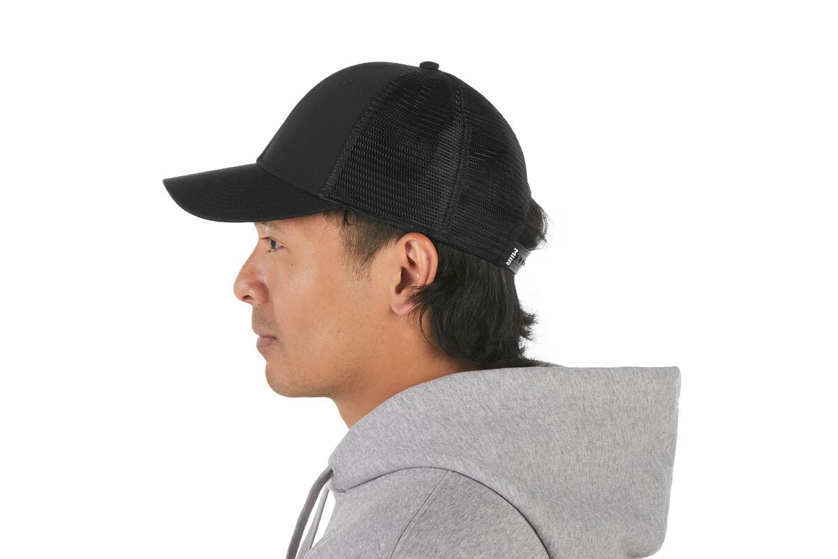 recycled-poly-low-profile-trucker-hat-i1 WebPDP-HAT002002_Recycled_Poly_Low_Profile_Trucker_Hat_Black_Studio_Harper_Studios_0723_Back__HAT002002OS.jpg