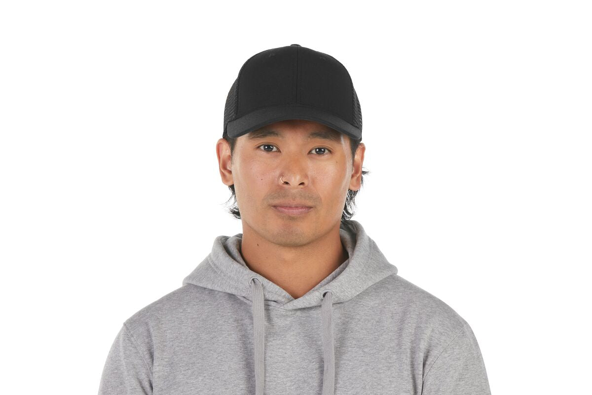 recycled-poly-low-profile-trucker-hat-i1 WebPDP-HAT002002_Recycled_Poly_Low_Profile_Trucker_Hat_Black_Studio_Harper_Studios_0723_Front__HAT002002OS.jpg